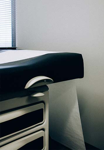 Doctors Office Interior With Exam Table Closeup